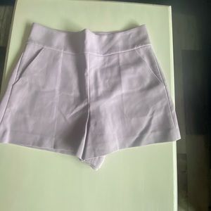 Alice +Olivia size 8 very light purple  is good condition